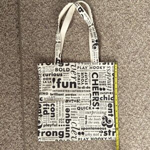 NWOT Kate Spade New York "What Do You Say" canvas tote bag.